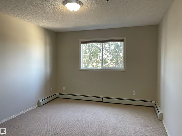 Property Photo:  2430 Guardian Road NW 319  AB T5T 6X9 