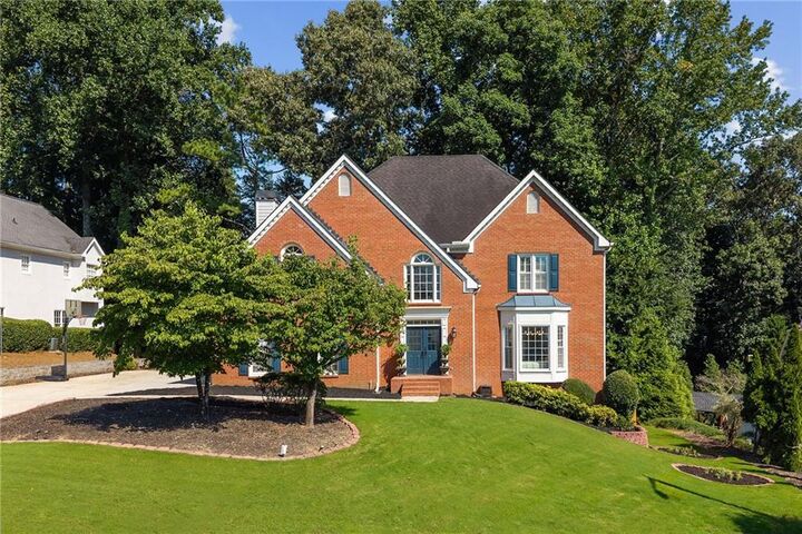 Property Photo:  10245 Groomsbridge Road  GA 30022 