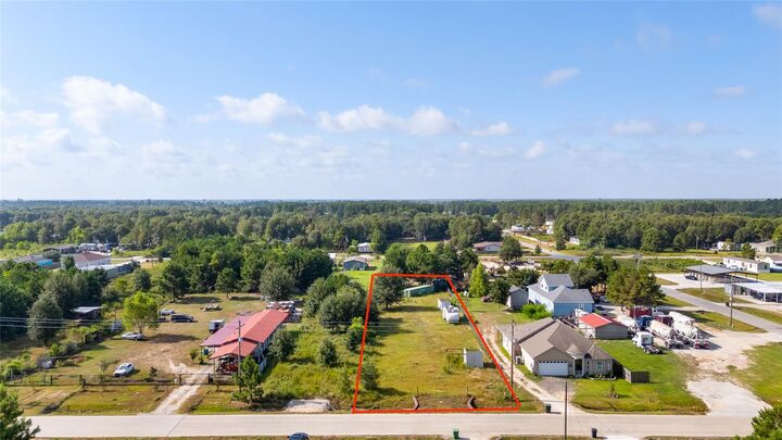 Property Photo: 1200 County Road 5017 TX 77327