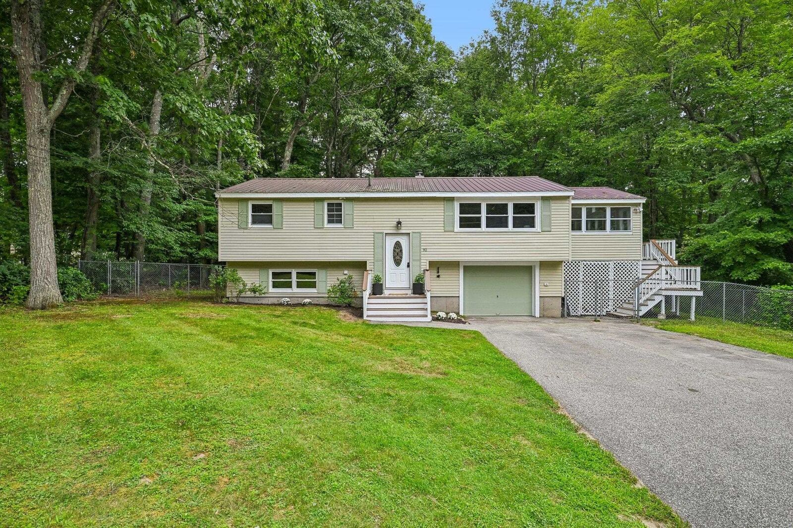 Property Photo: 92 Bypass 28 NH 03038