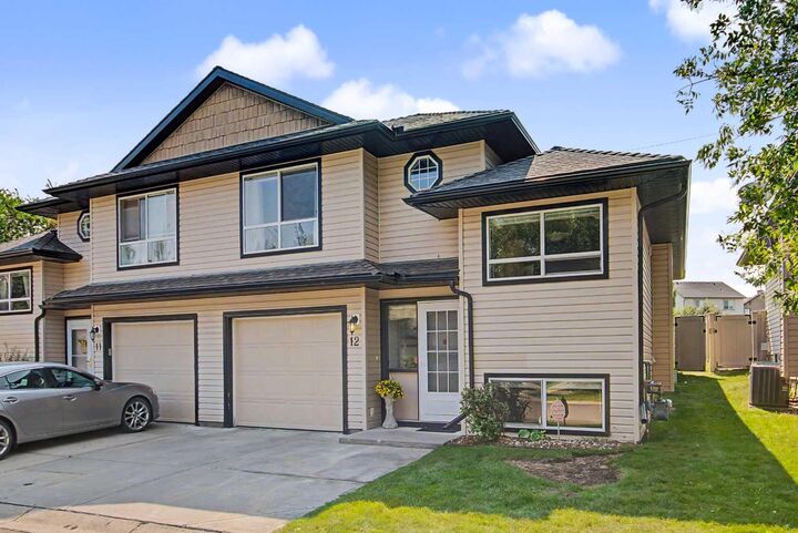 Property Photo:  103 Fairways Drive NW 12  AB T4B 2Y5 