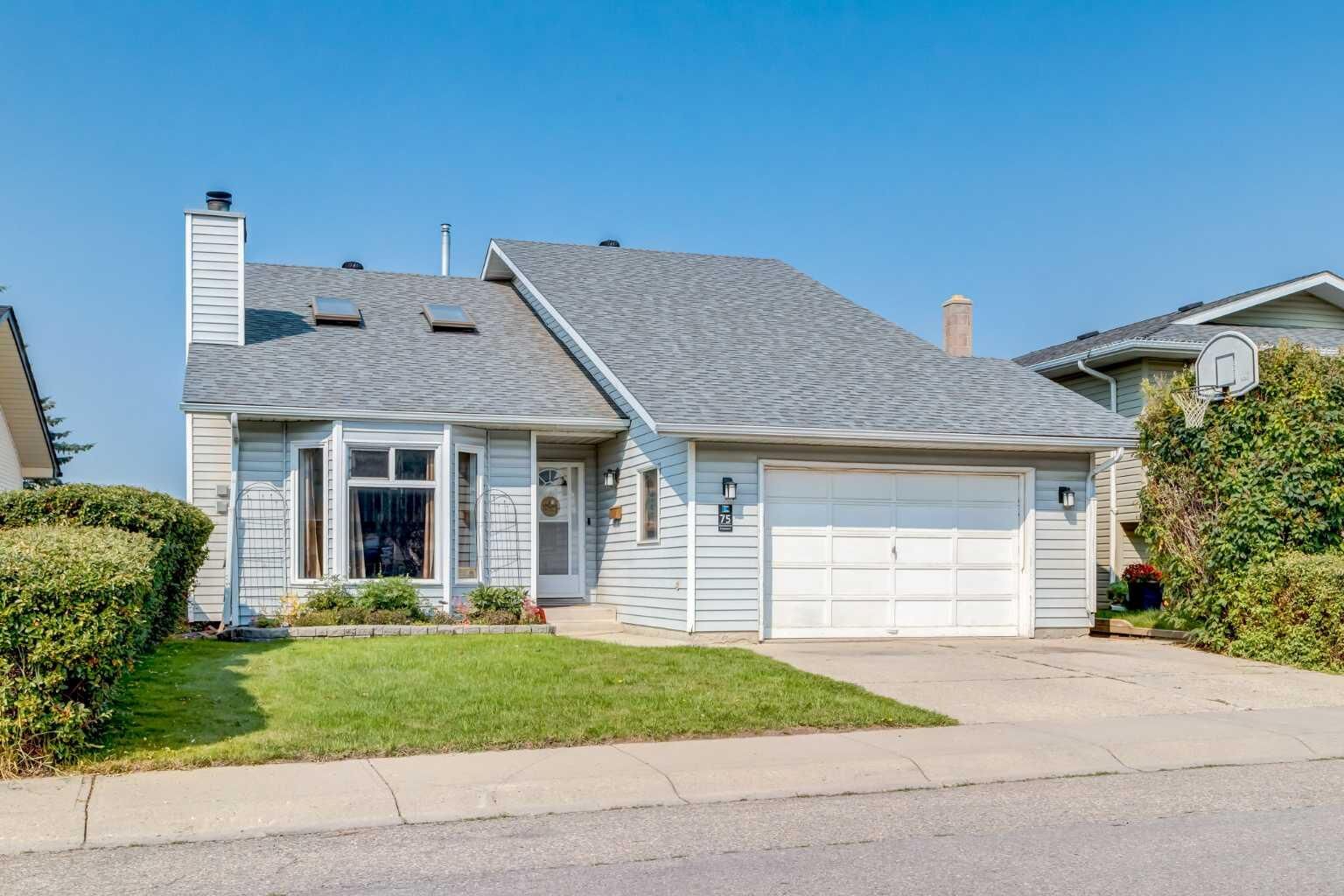 Property Photo:  75 Sandstone Crescent SE  AB T4B 1T7 