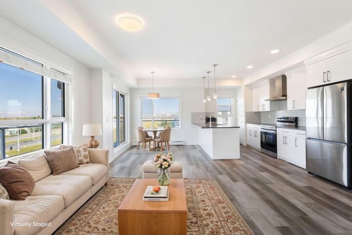 Property Photo: 100 Harvest Hills Place NE 407 AB T3K 2N4