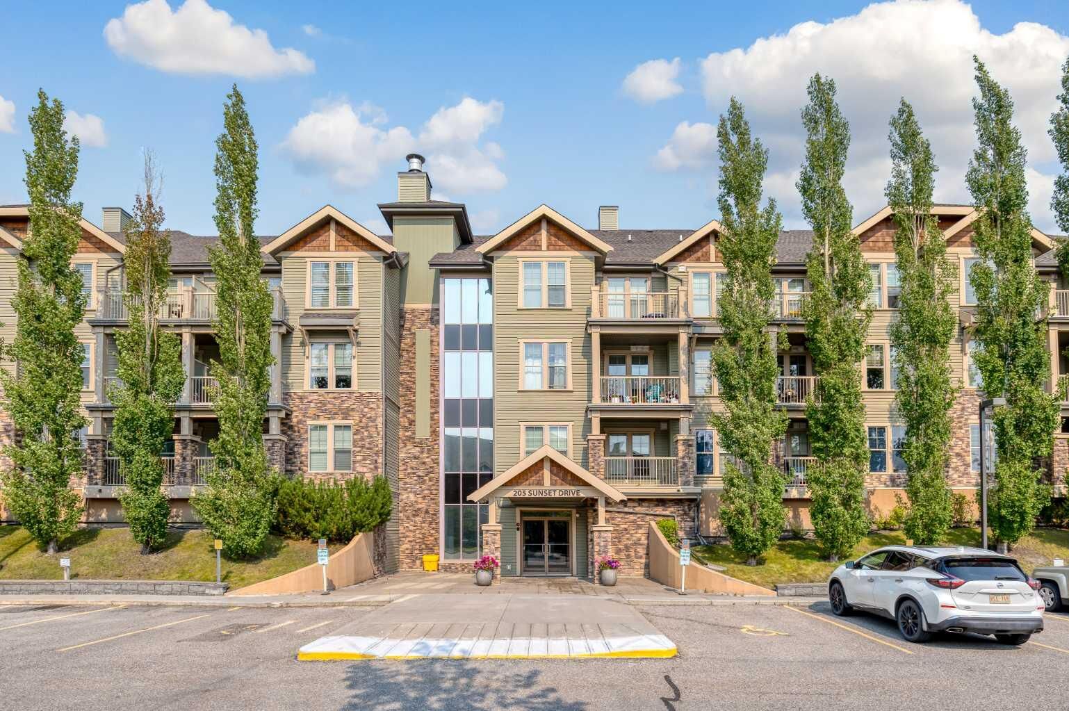 Property Photo: 205 Sunset Drive 320 AB T4C 0H6