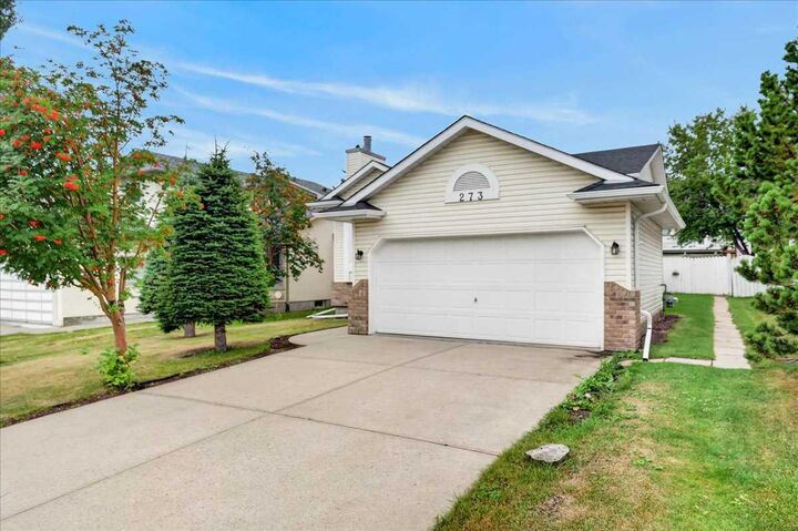 Property Photo:  273 Sandarac Drive NW  AB T3K 3W8 