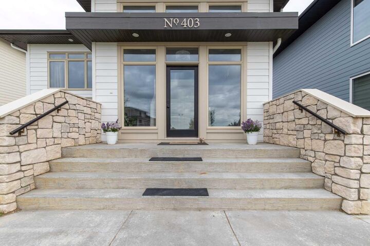 Property Photo:  403 Caledonia Boulevard W  AB T1J 5W2 