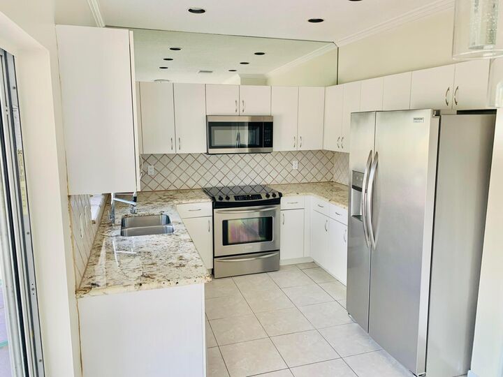 Property Photo:  10837 Palm Spring Drive  FL 33428 