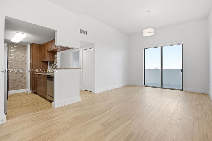 Property Photo:  36 NW 6th Ave Ts-3  FL 33128 