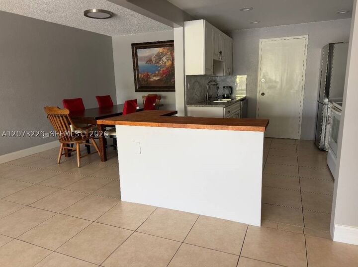Property Photo:  800 NE 195th St 211  FL 33179 
