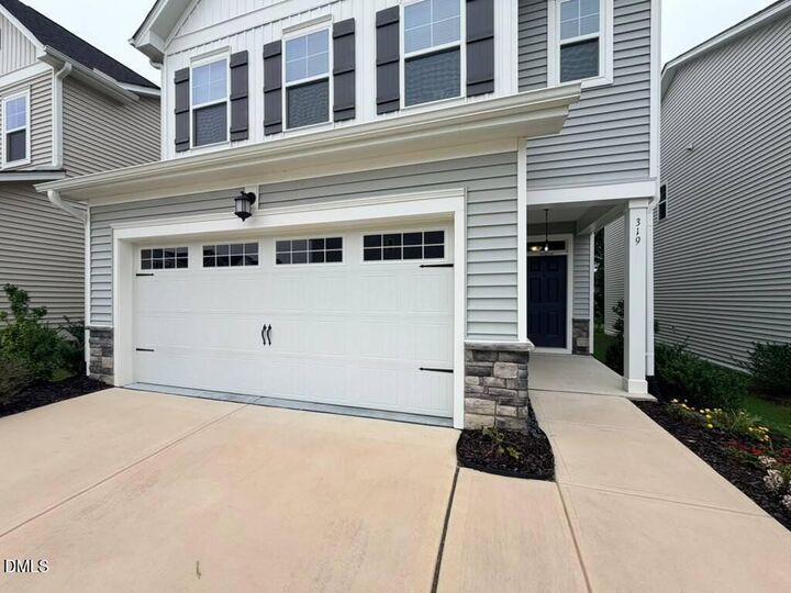 Property Photo:  319 Aster Bloom Lane  NC 27610 