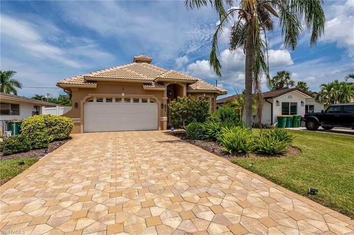 Property Photo:  651 106th Ave N  FL 34108 
