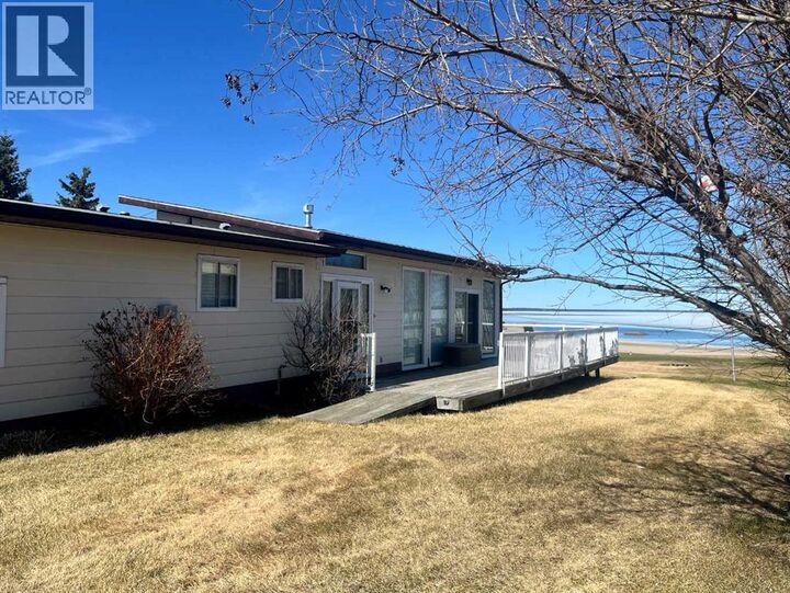 Property Photo:  303 Cumming Drive  SK S0M 1J0 