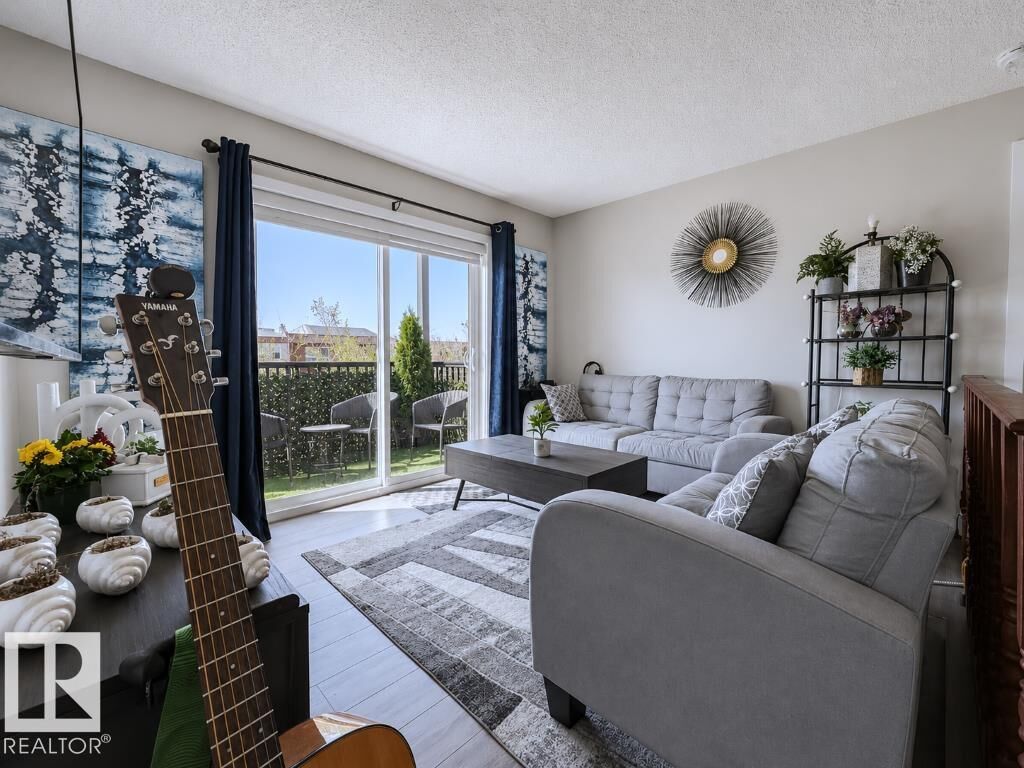 Property Photo:  14808 125 Street NW 311  AB T5X 0G1 