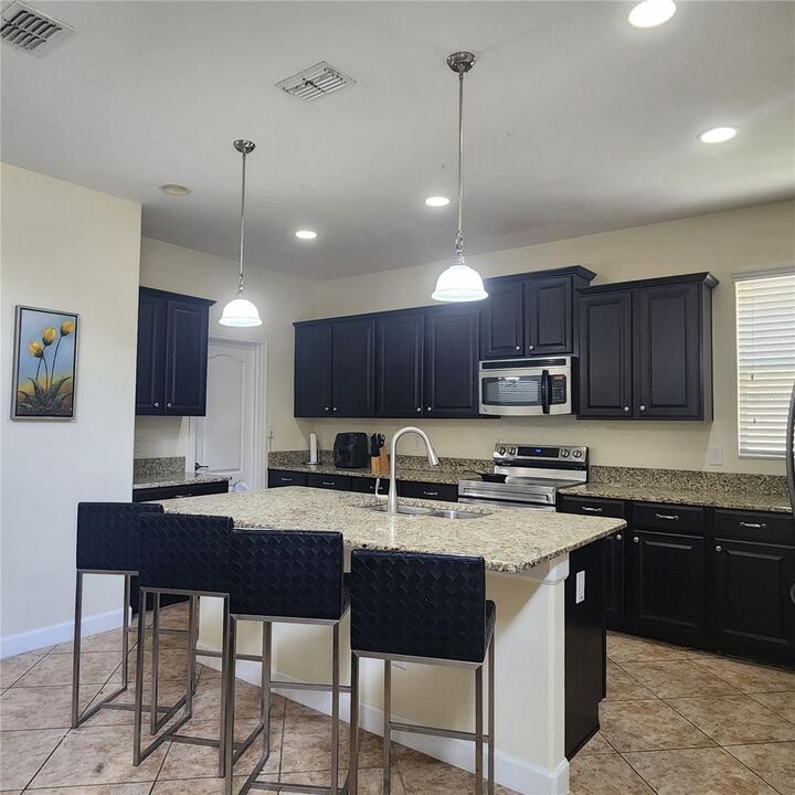 Property Photo:  8935 Cuban Palm Road  FL 34747 