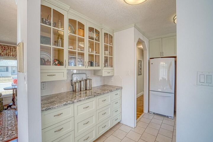 Property Photo:  7412 Fleetwood Drive SE  AB T2H 0X1 