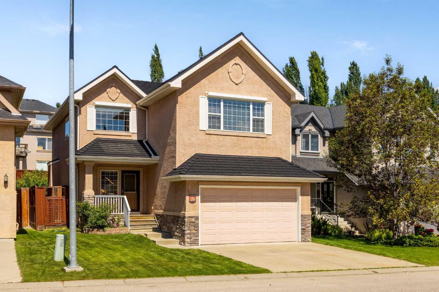 Property Photo: 139 Tuscany Ridge Close NW AB T3L 2K6