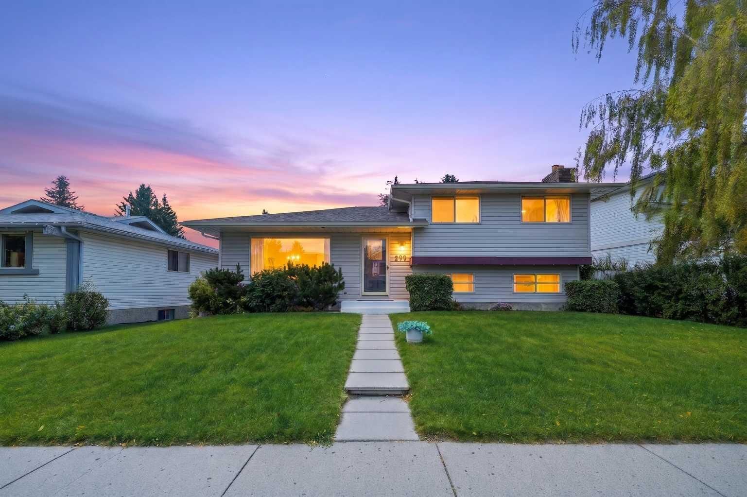 Property Photo: 299 Woodside Circle SW AB T2W 3K2