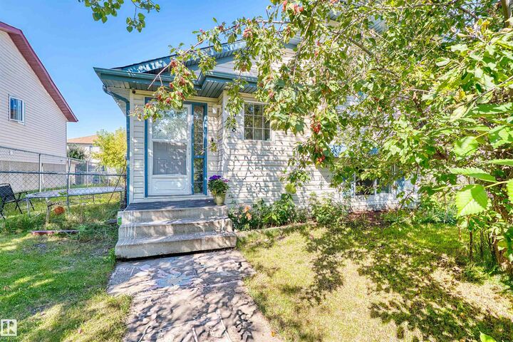 Property Photo:  13028 34 Street NW  AB T5A 5G7 