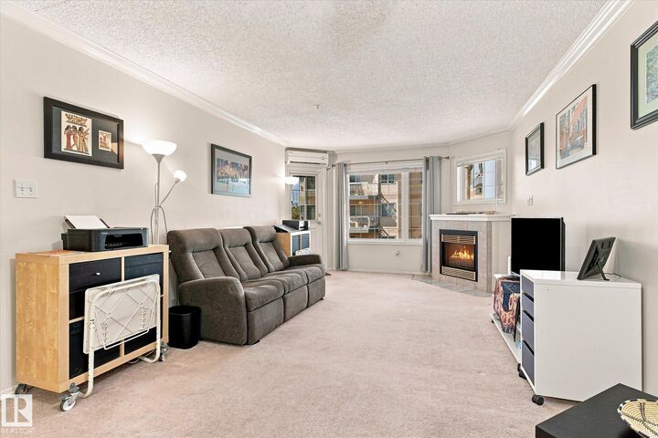 Property Photo:  13450 114 Avenue NW 309  AB T5M 4C4 