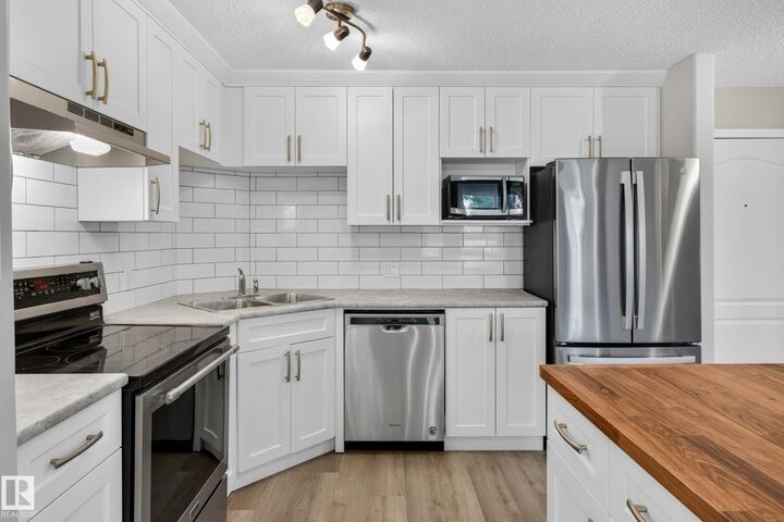 Property Photo:  5340 199 Street NW 120  AB T6M 0A5 
