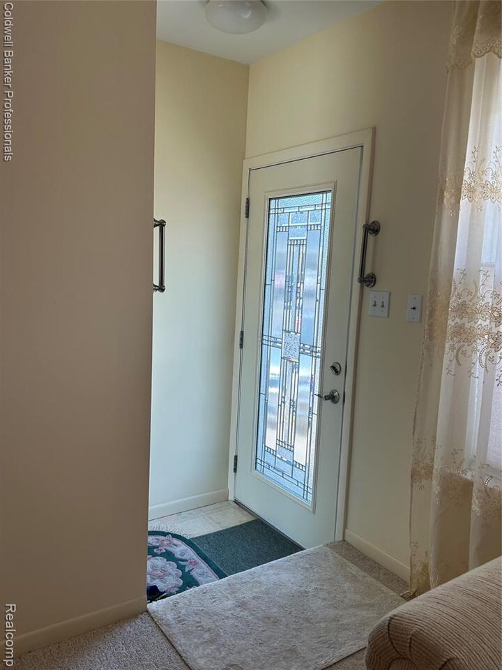 Property Photo:  49936 Helfer Boulevard W 8  MI 48393 