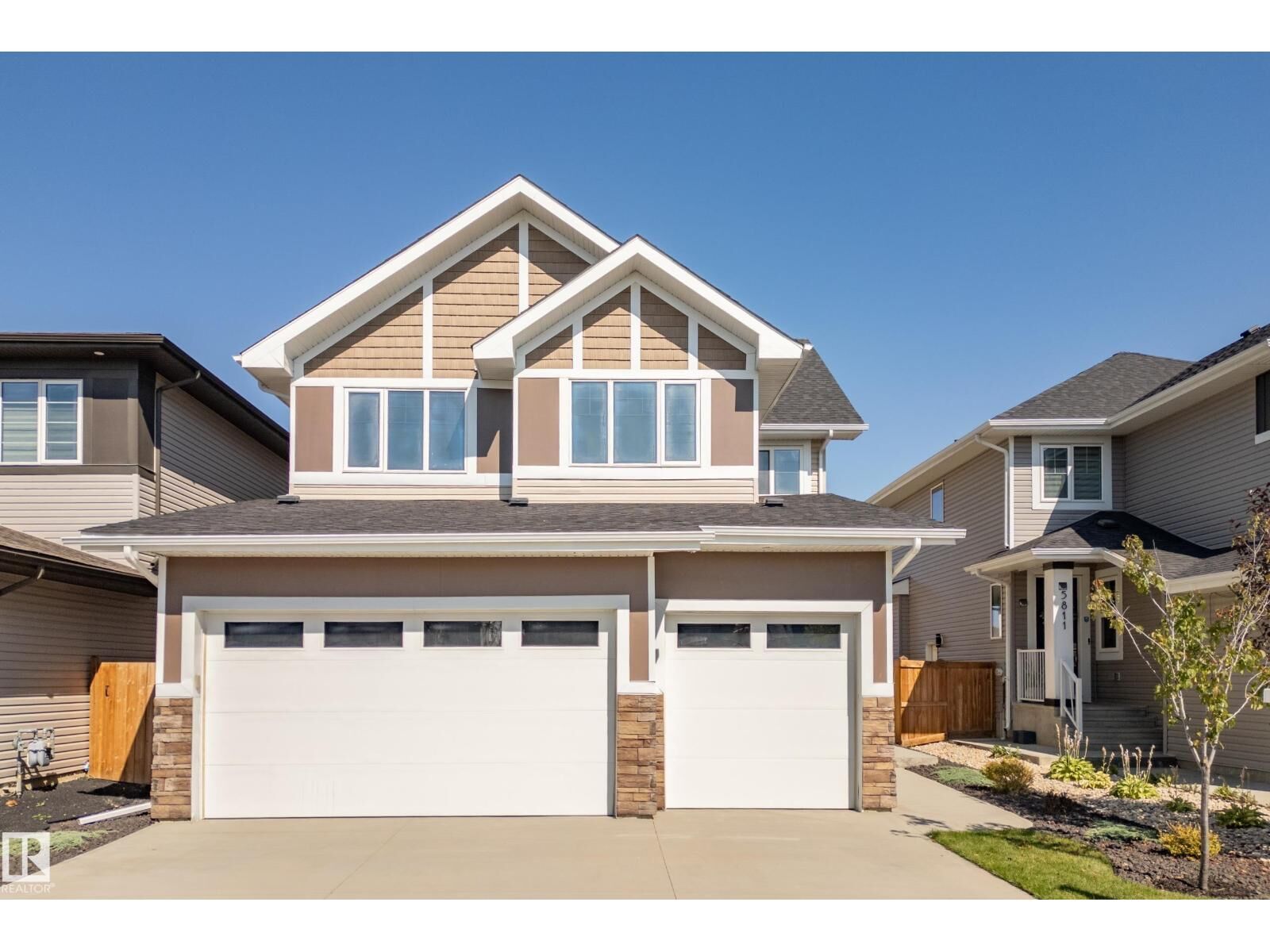 Property Photo:  5813 Pelerin Cr  AB T4X 2X8 