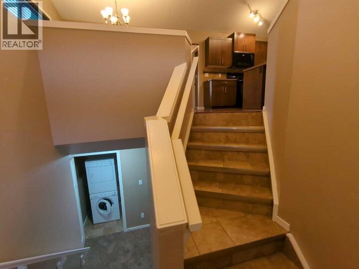 Property Photo: 144 Mt Sundial Court West AB T1J 5C3