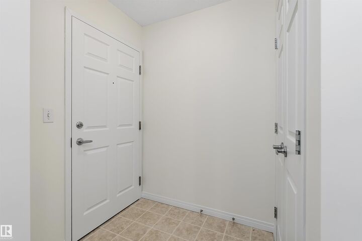 Property Photo:  630 McAllister Loop SW 201  AB T6W 1N3 