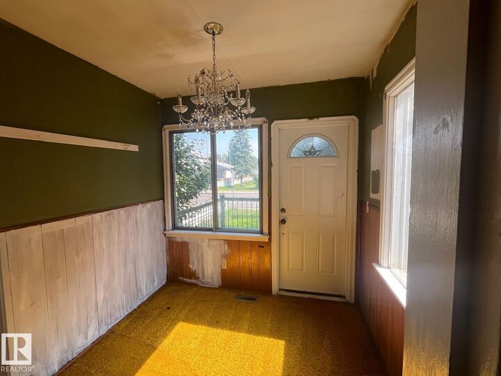 Property Photo:  11408 82 Street NW  AB T5B 2V4 