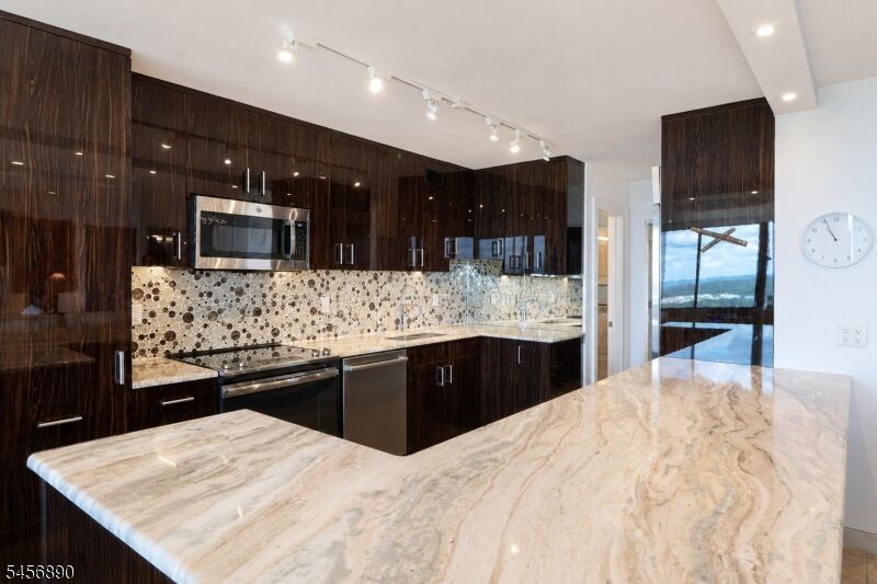 Property Photo: 1 Claridge Dr 1025 NJ 07044