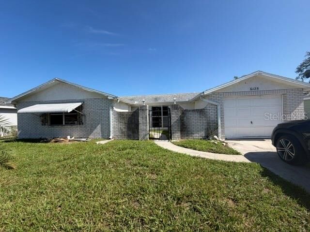 Property Photo: 6125 Seabreeze Drive FL 34668