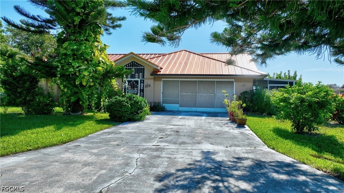 Property Photo: 237 Lauberge Court FL 33936