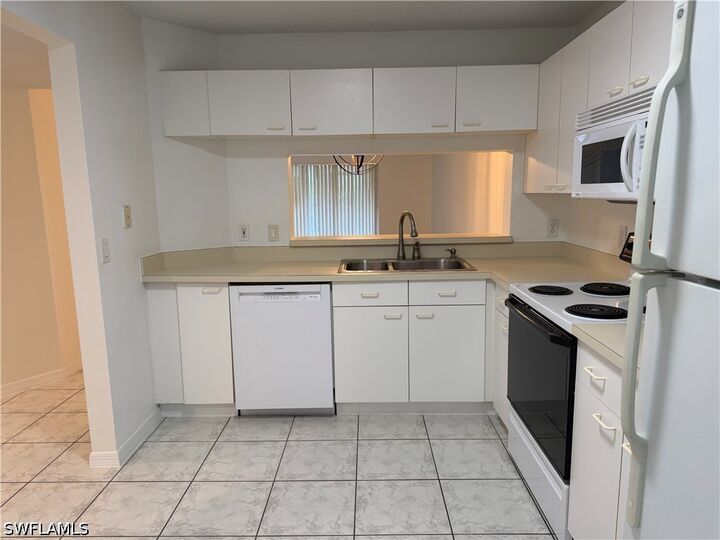 Property Photo:  7755 Jewel Lane 103  FL 34109 