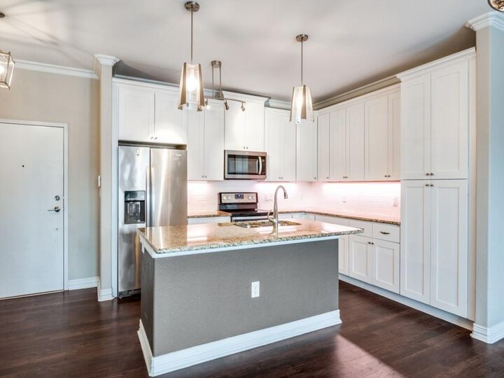 Property Photo: 2500 King Arthur Boulevard 206 TX 75056