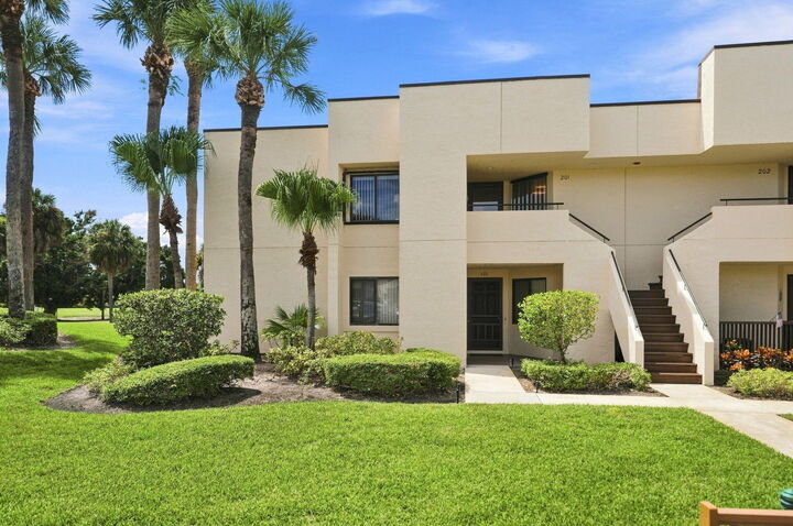Property Photo:  6940 SE Constitution 201  FL 33455 