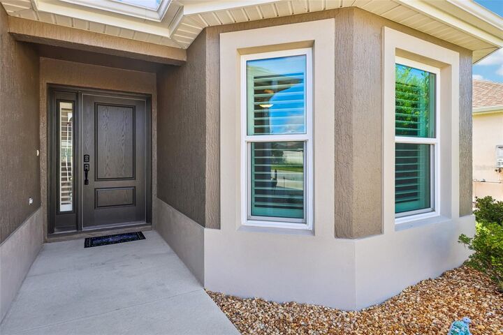Property Photo:  6358 Merhottein Loop  FL 32163 