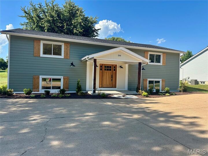 Property Photo:  200 Park Charles Boulevard  MO 63376 
