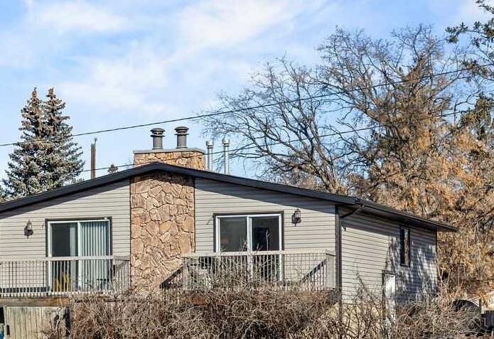 Property Photo:  7006A Bowness Road NW  AB T3B 0G4 