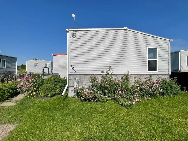 Property Photo: 5308 57 Street 155 AB T9V 2A3