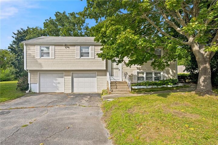 Property Photo:  63 Bourbon Street  RI 02871 