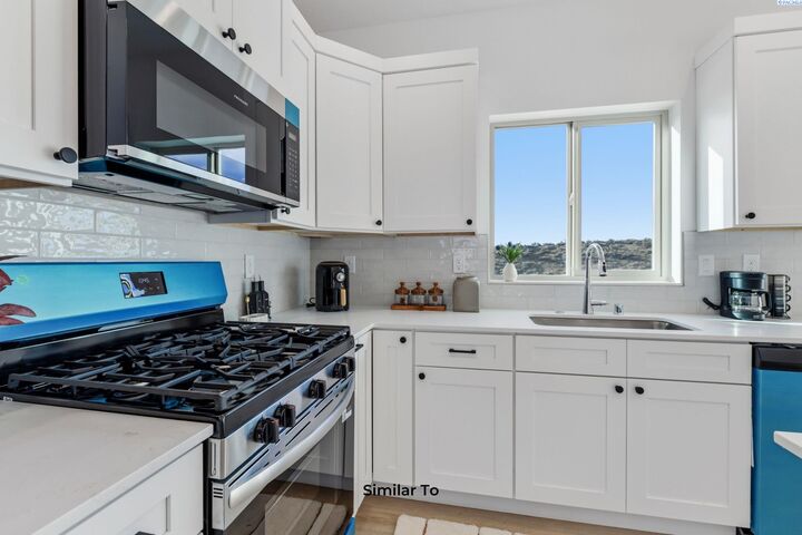 Property Photo: 4218 Road 114 WA 99301