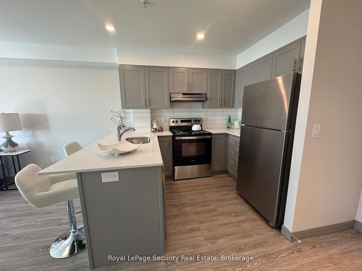 Property Photo:  1015 Innisfil Beach Road 307  ON L9S 1T3 