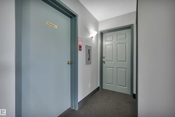 Property Photo:  2 Alpine Boulevard 305  AB T8N 3Y3 