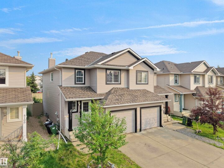 Property Photo: 8111 7 Ave Avenue SW AB T6X 1L9