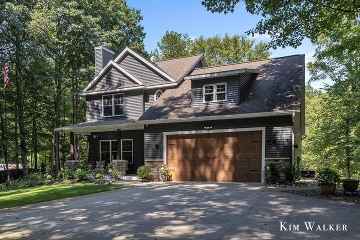 Property Photo:  5813 Hunters Ridge  MI 49408 
