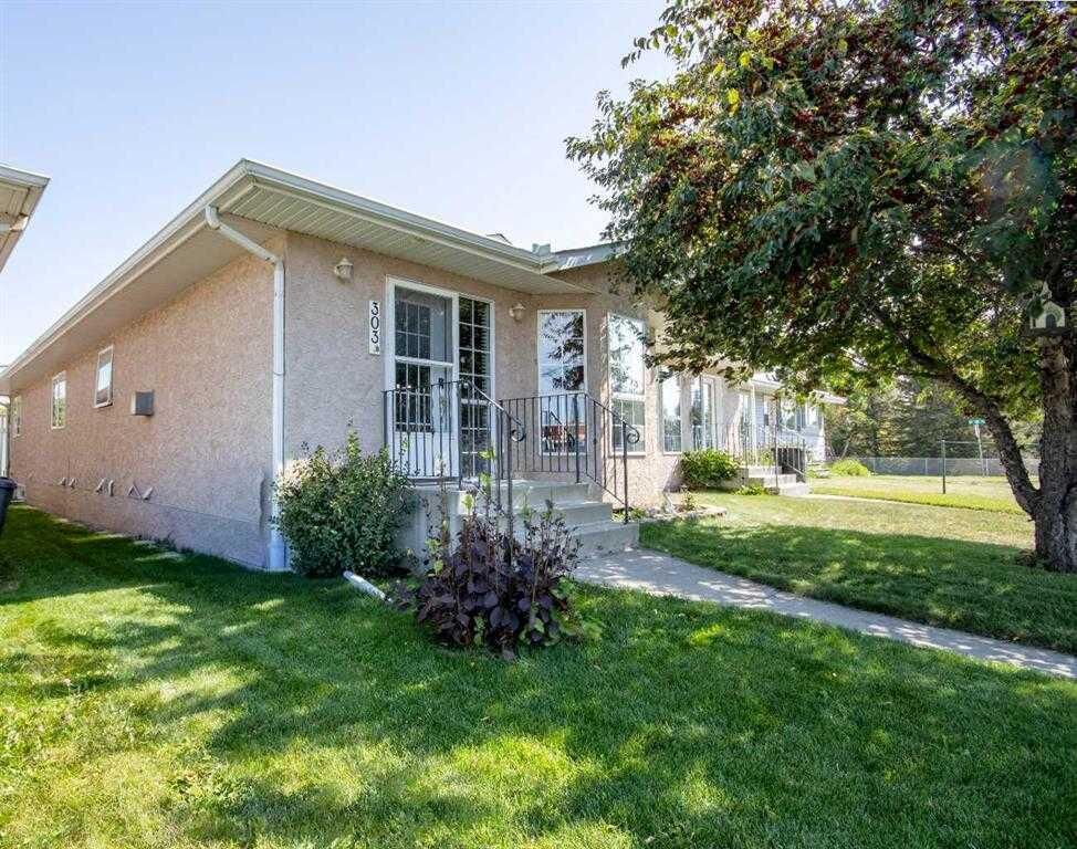 Property Photo:  303B Centre Street N  AB T0M 1X0 