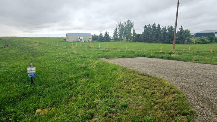 Property Photo:  270182 Inverlake Road  AB T1X 2E3 