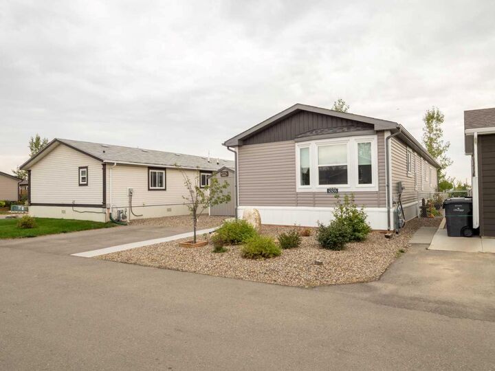 Property Photo:  1003 Summer Street  AB T1M 0C6 