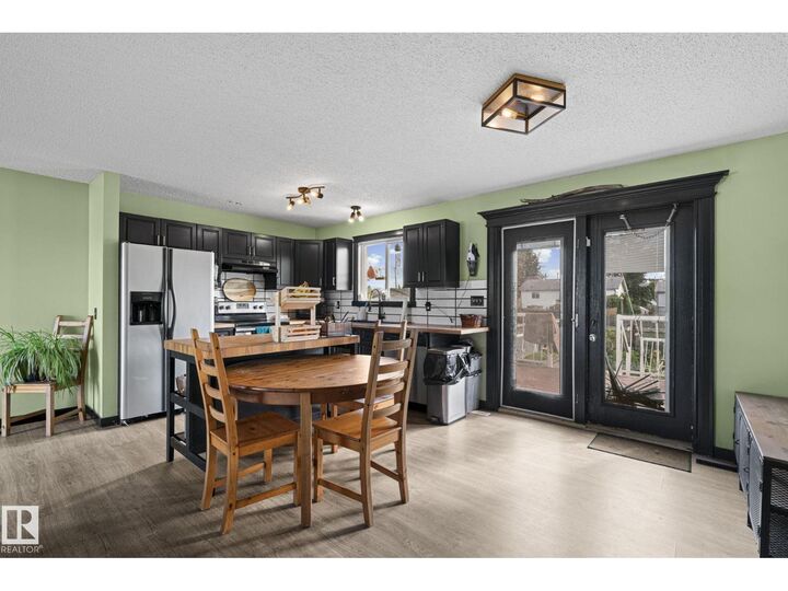 Property Photo:  34 Spruce Meadow Ln  AB T0A 0K0 