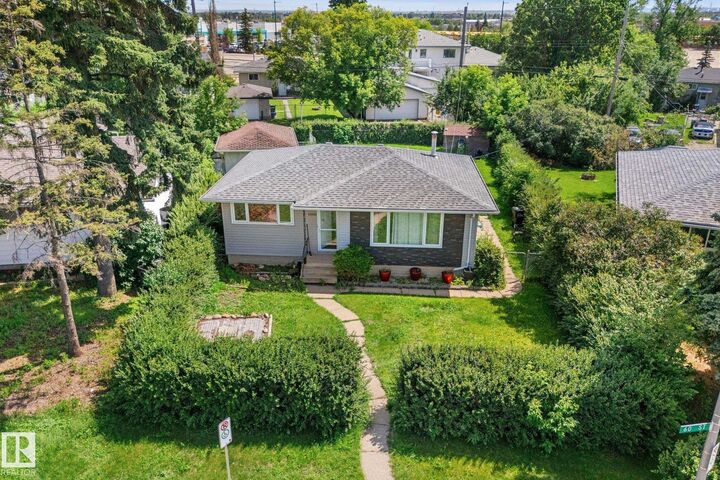 Property Photo: 13131 60 Street NW AB T5A 0S2